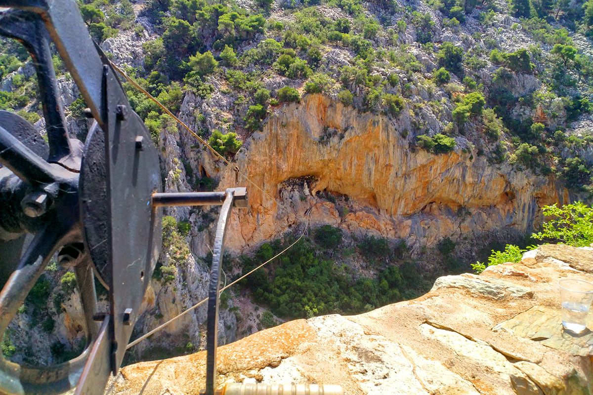 check the unusual way of lighting the candles on the opposite cliffs